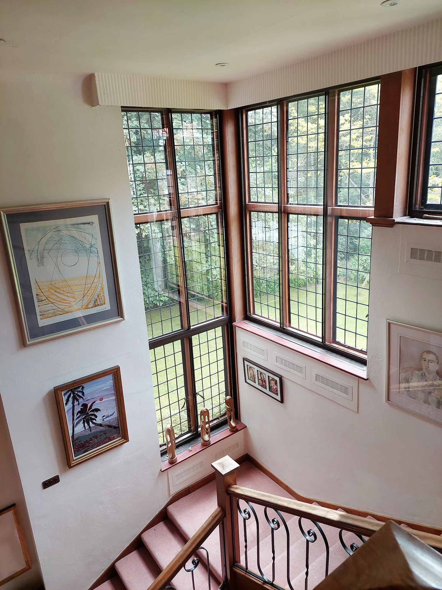 Tall secondary glazing window garden view