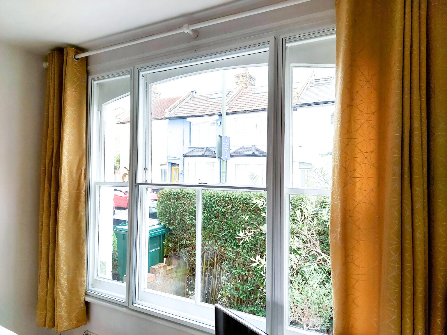 secondary glazing window-looking out to front garden